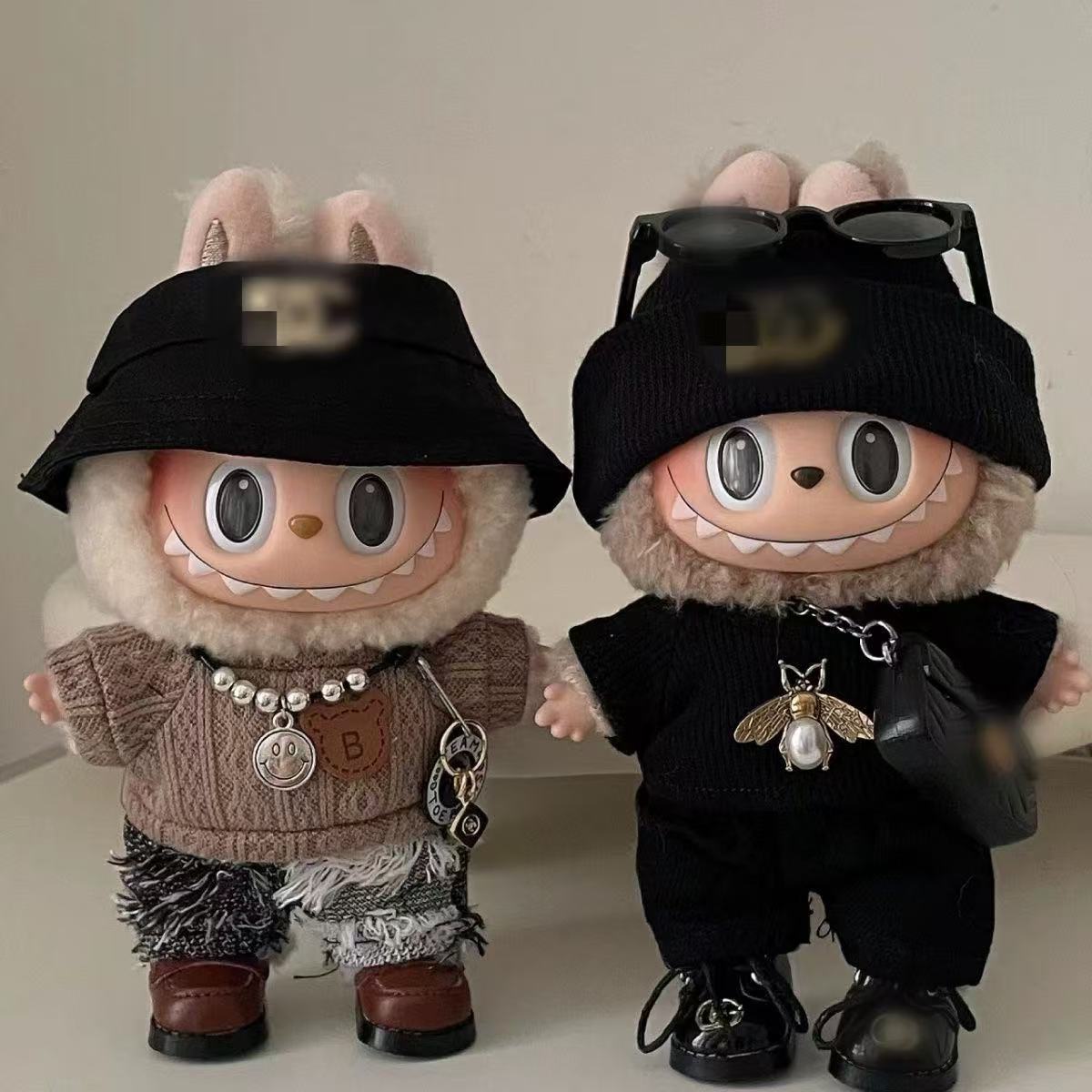 Labubu Streetstyle: Schwarze Sportkleidung mit Mütze